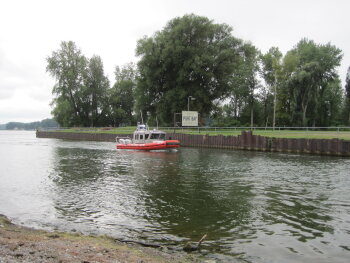 Coast Guard traveling through PB Channel